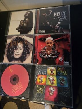 CDs Nelly, Eve, Sade, Janet Jackson, ICP